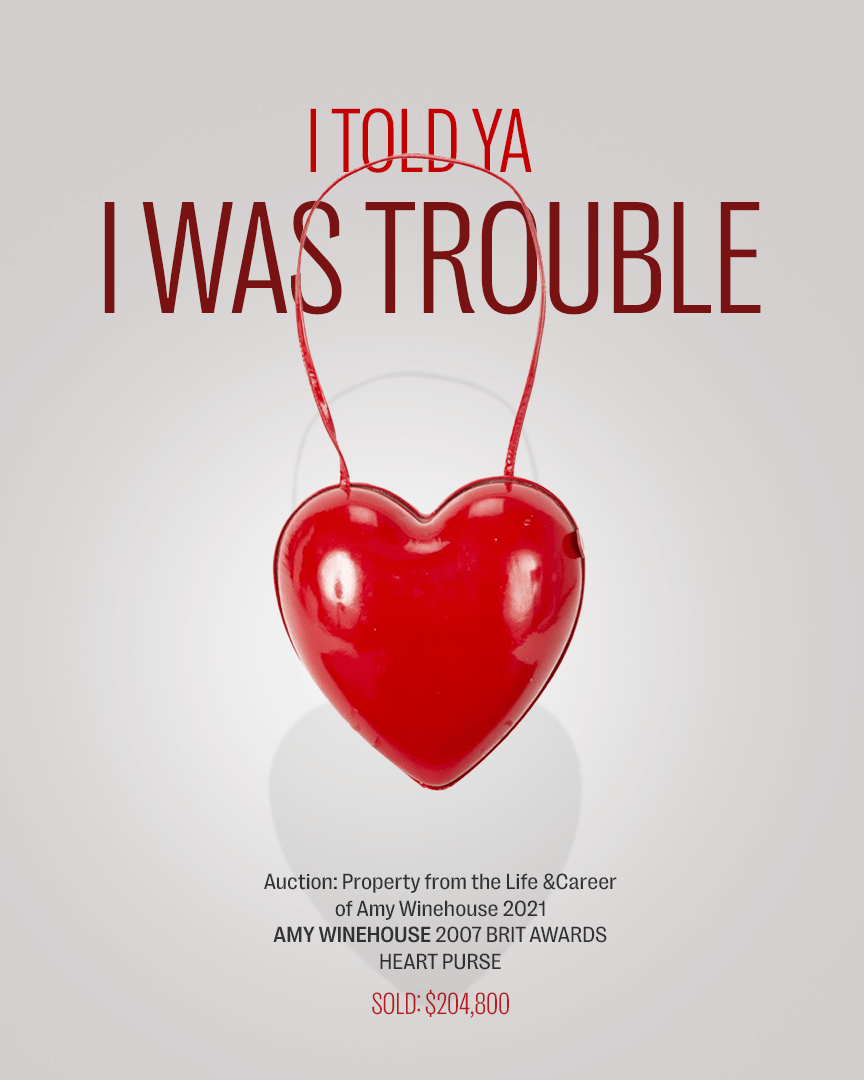 a poster with a red heart and the words i told ya i was trouble