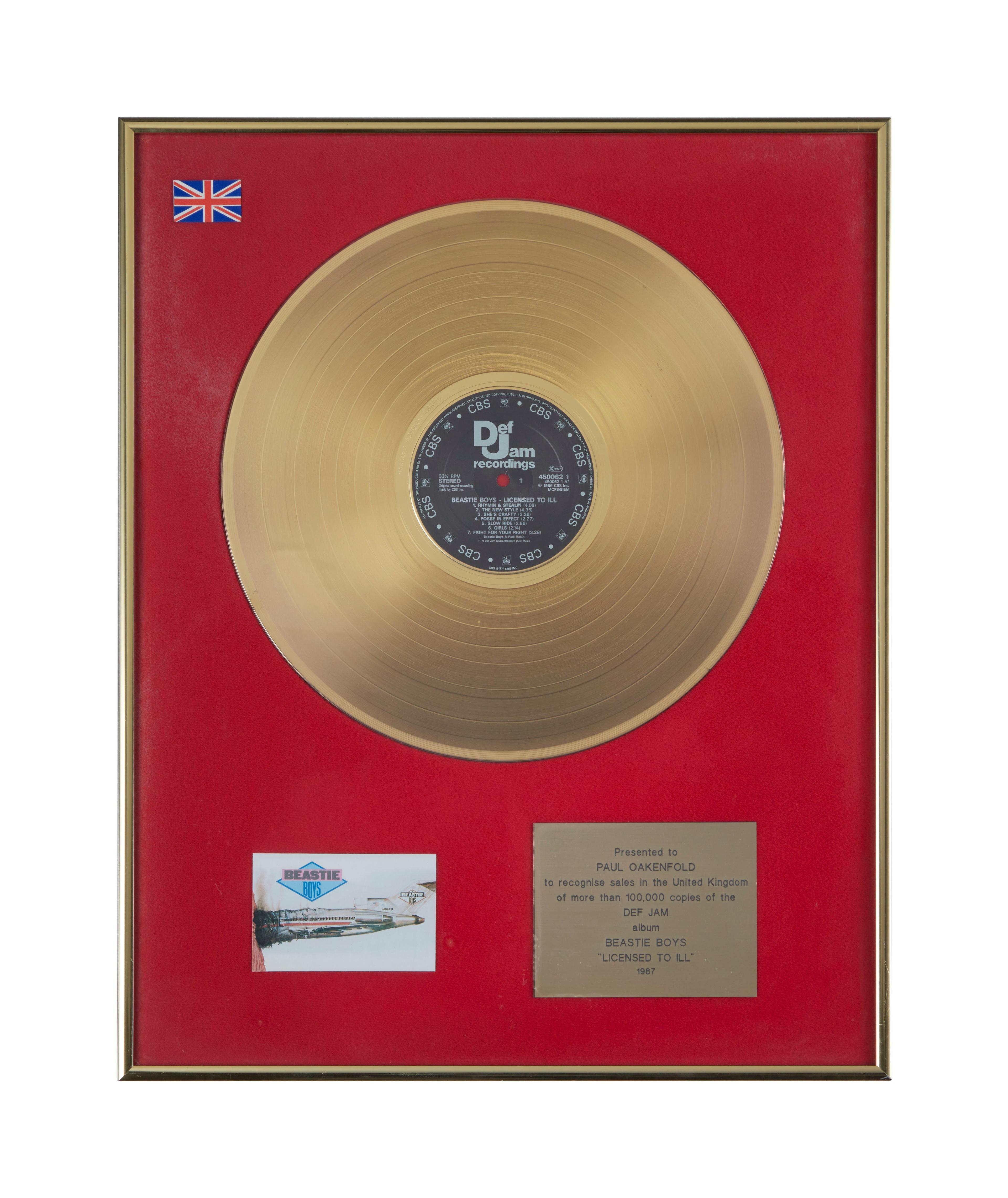 a gold record in a red frame that says pepsi on it