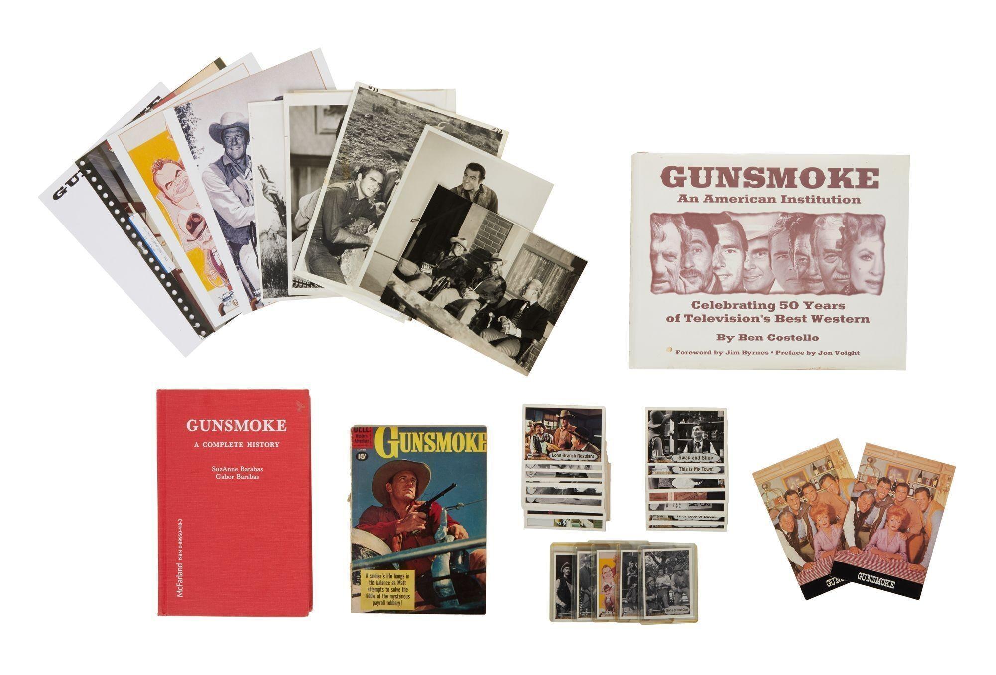 Lot #307. Burt Reynolds | "Gunsmoke" Books and Other Ephemera a collection of gunsmokes memorabilia including a book