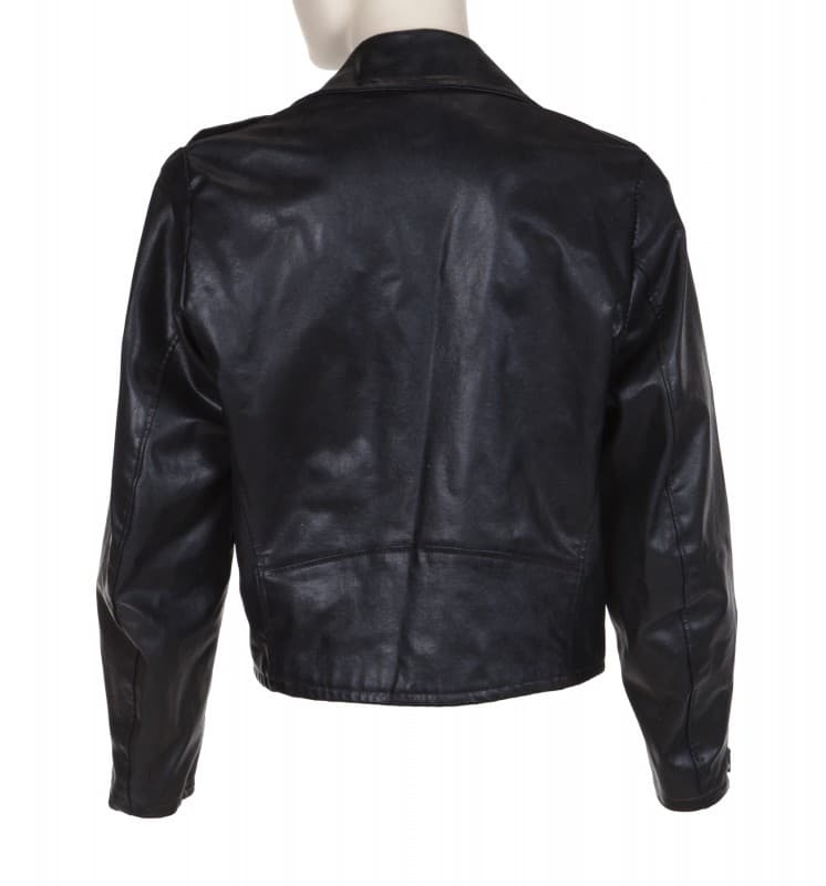 the back of a black leather jacket on a mannequin
