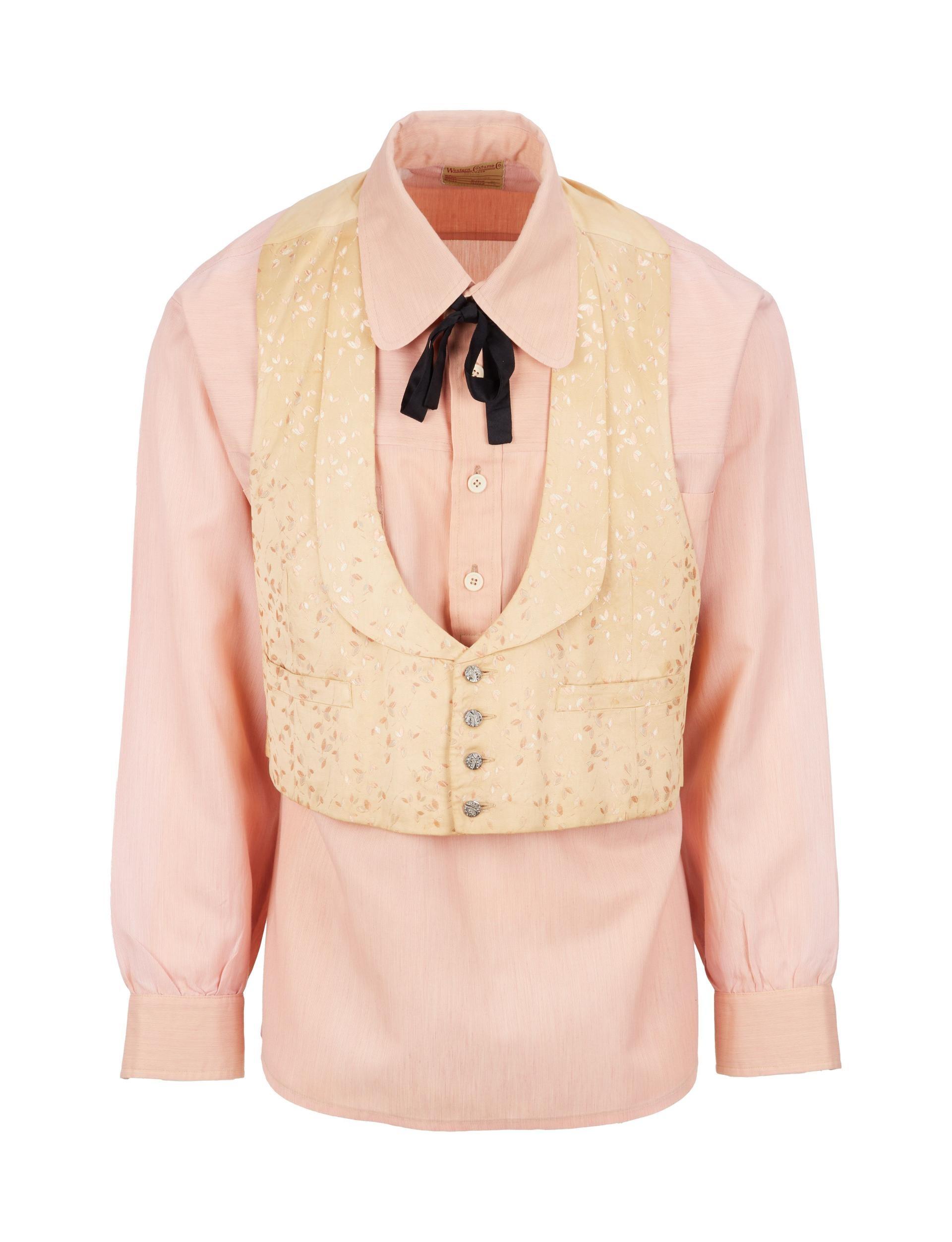 a salmon colored dress short and peach western vest