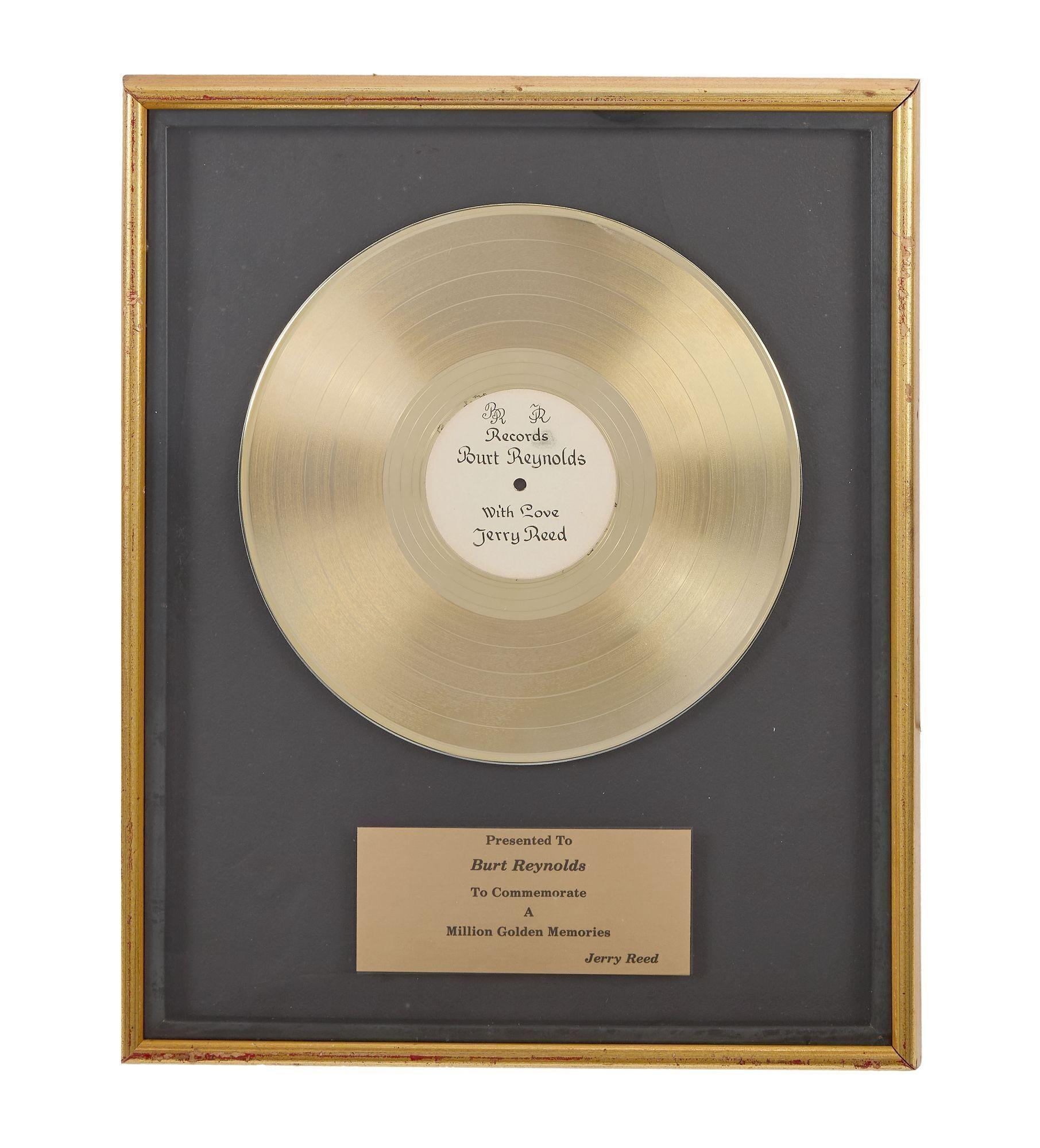 a gold record with the words burt reynolds on it