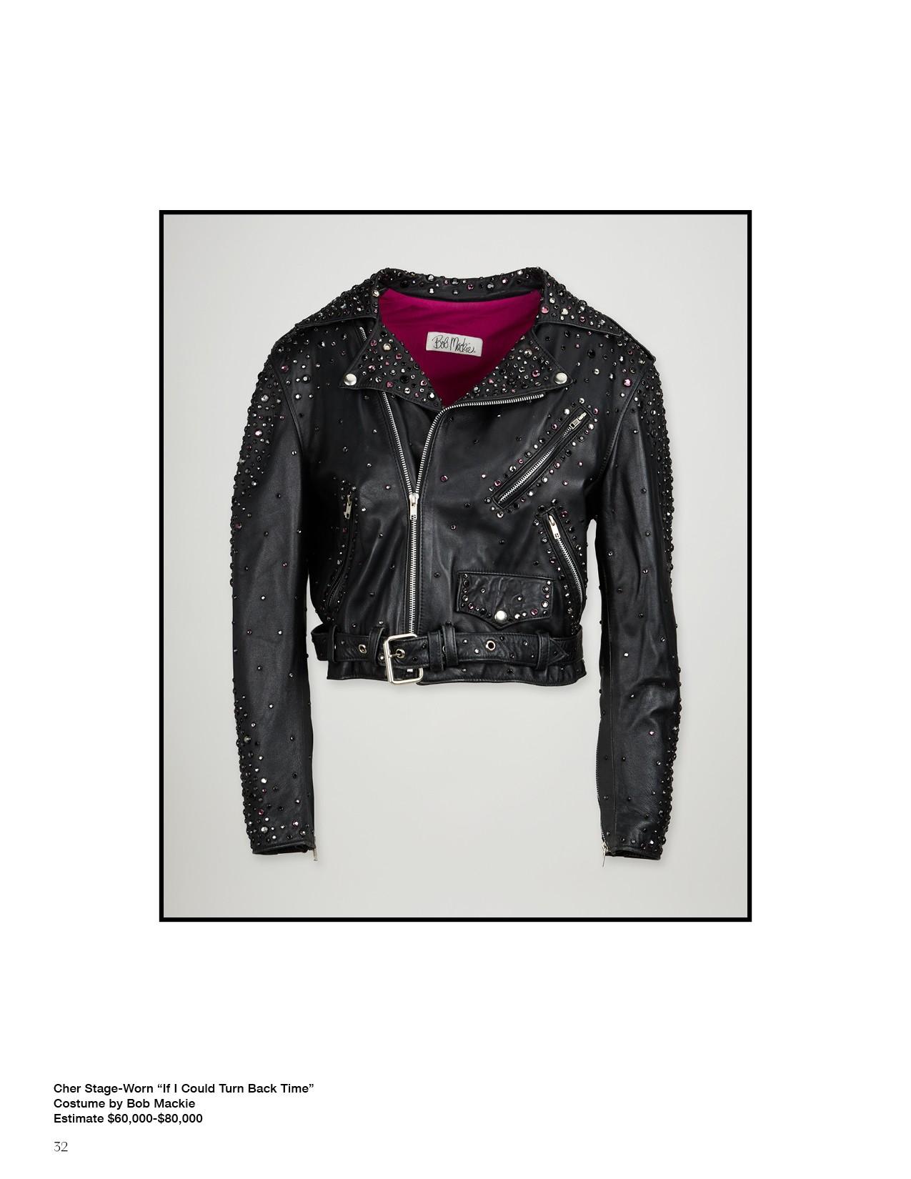 a black leather jacket with rhinestones on the sleeves