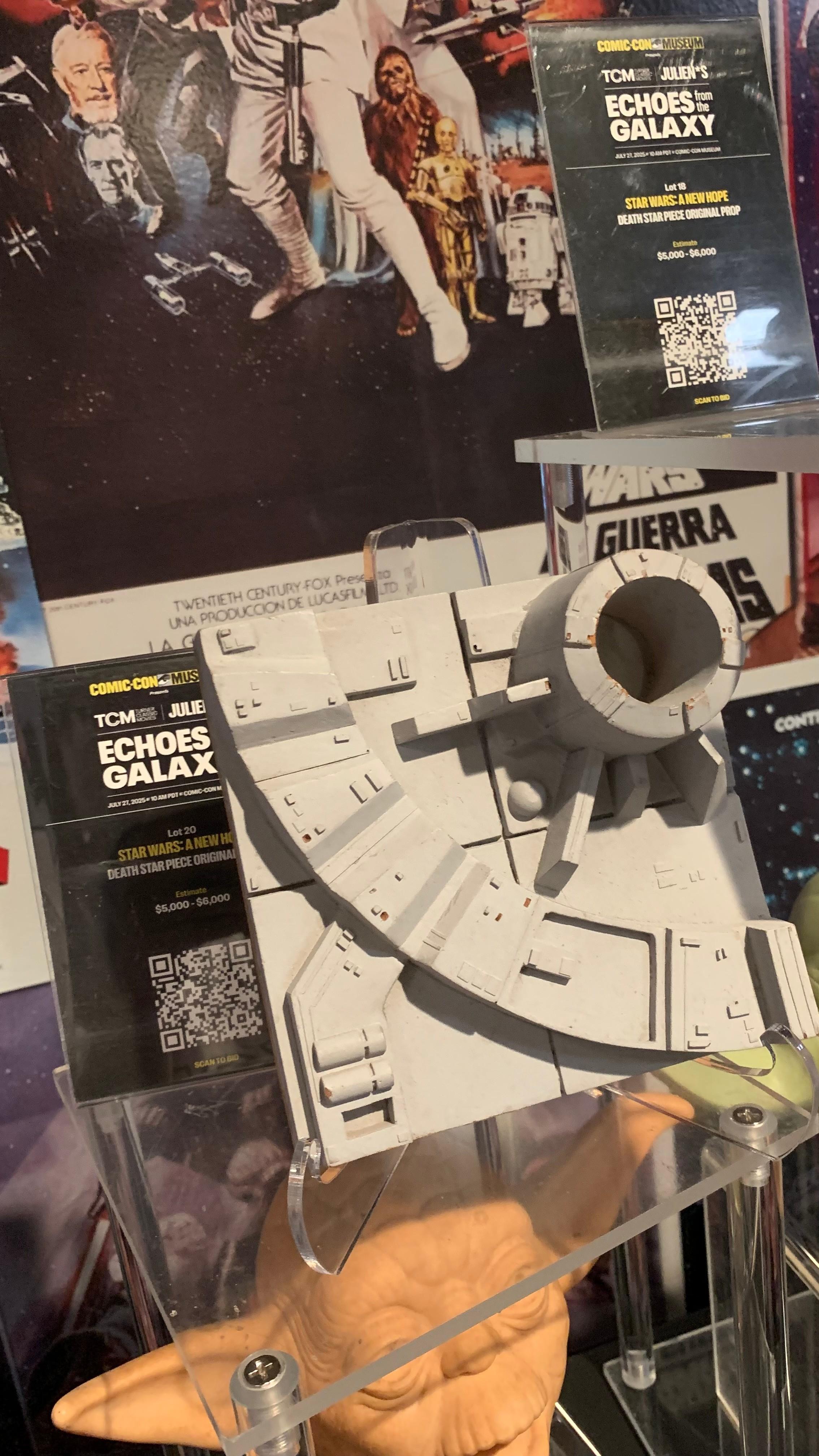 a star wars artifacts on display at the comic con museum