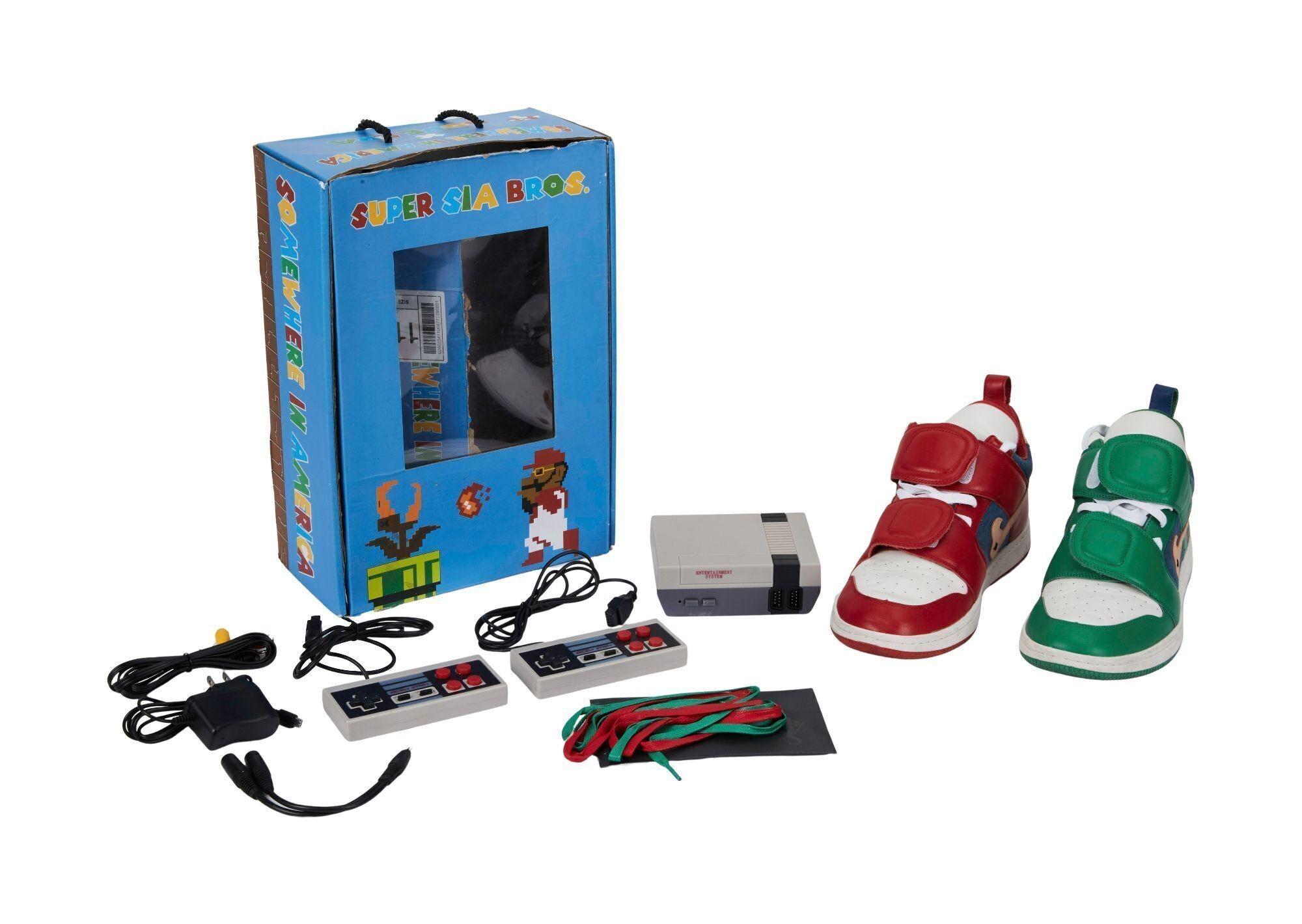Lot #464. Angus Cloud | DS SIA Collective X Dope Era VULTR SK8 “Mario Luigi” Sneakers with Pre-Loaded Siatendo and Controllers a pair of shoes sitting next to a box that says super mario bros