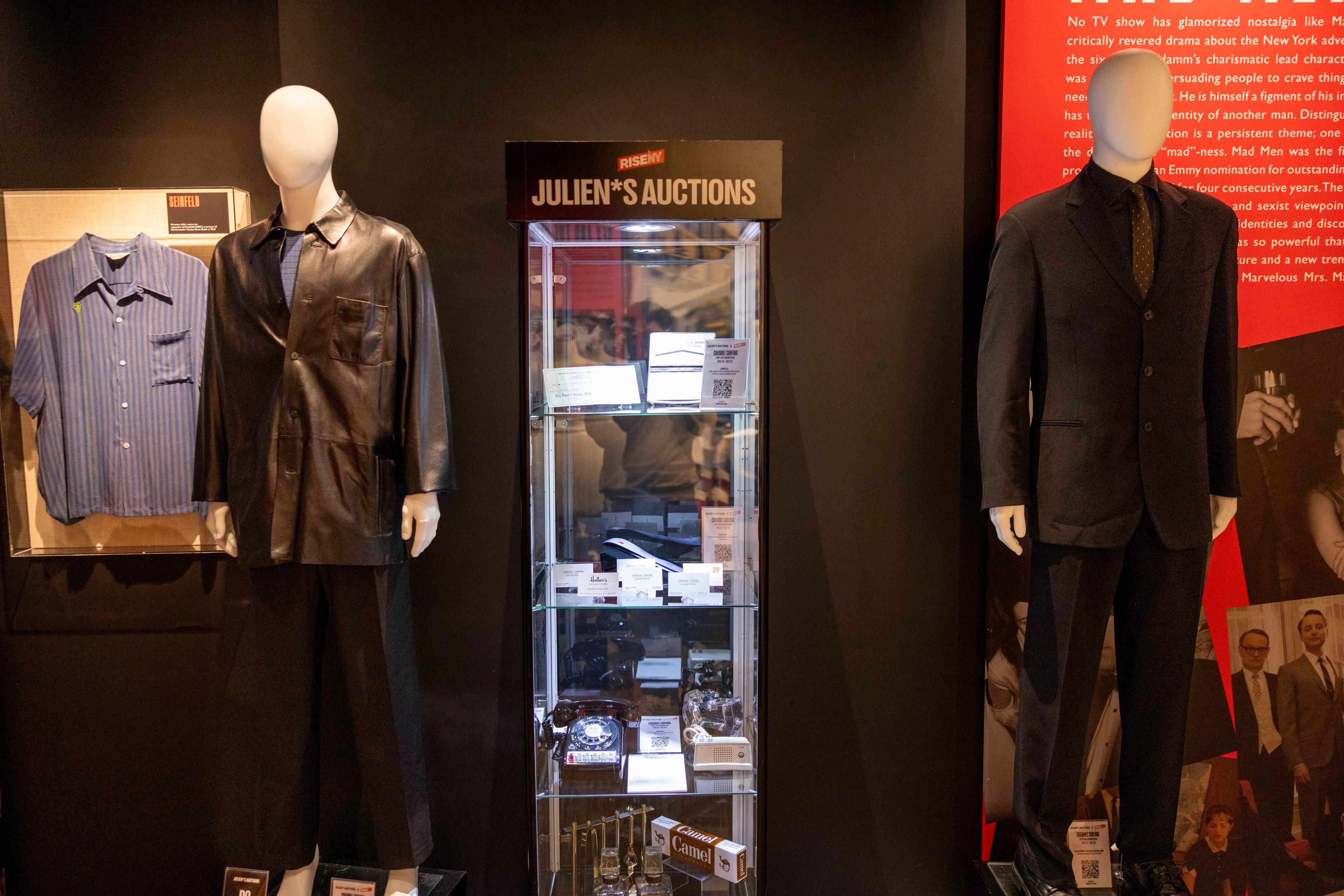 two mannequins wearing suits