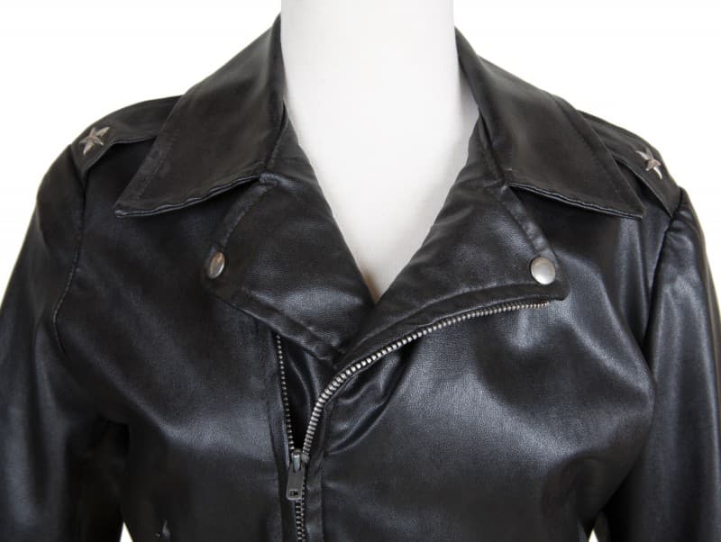 a close up of a black leather jacket on a mannequin