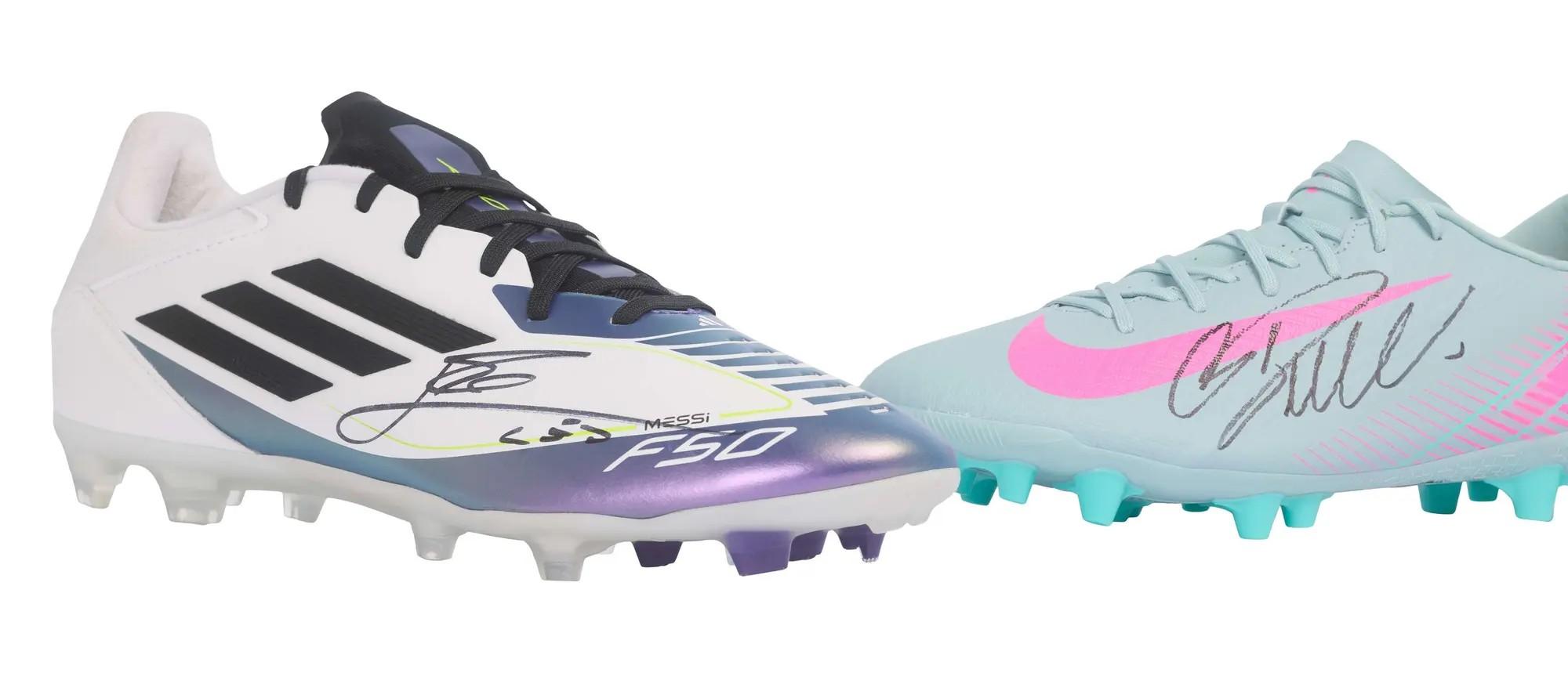 Lot #183  Lionel Messi and Ronaldo Signed Boots (2)