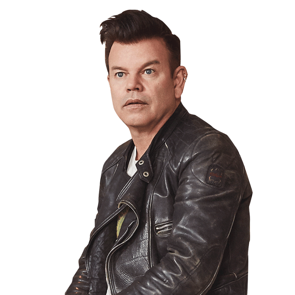 a man wearing a black leather jacket with the letter o on it