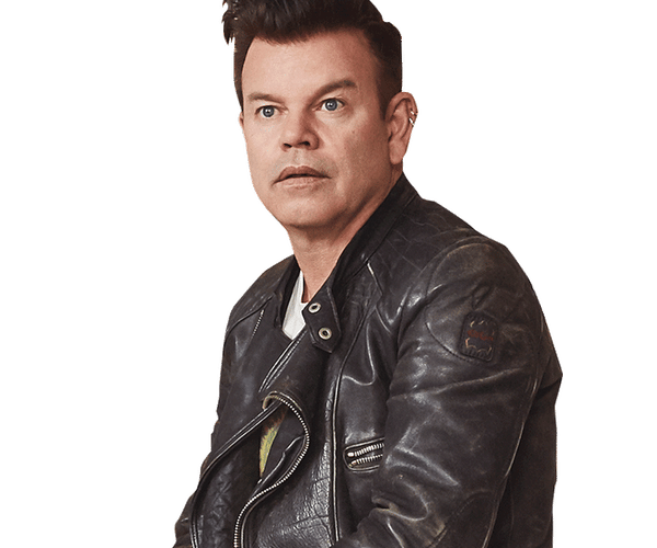 a man wearing a black leather jacket with the letter o on it