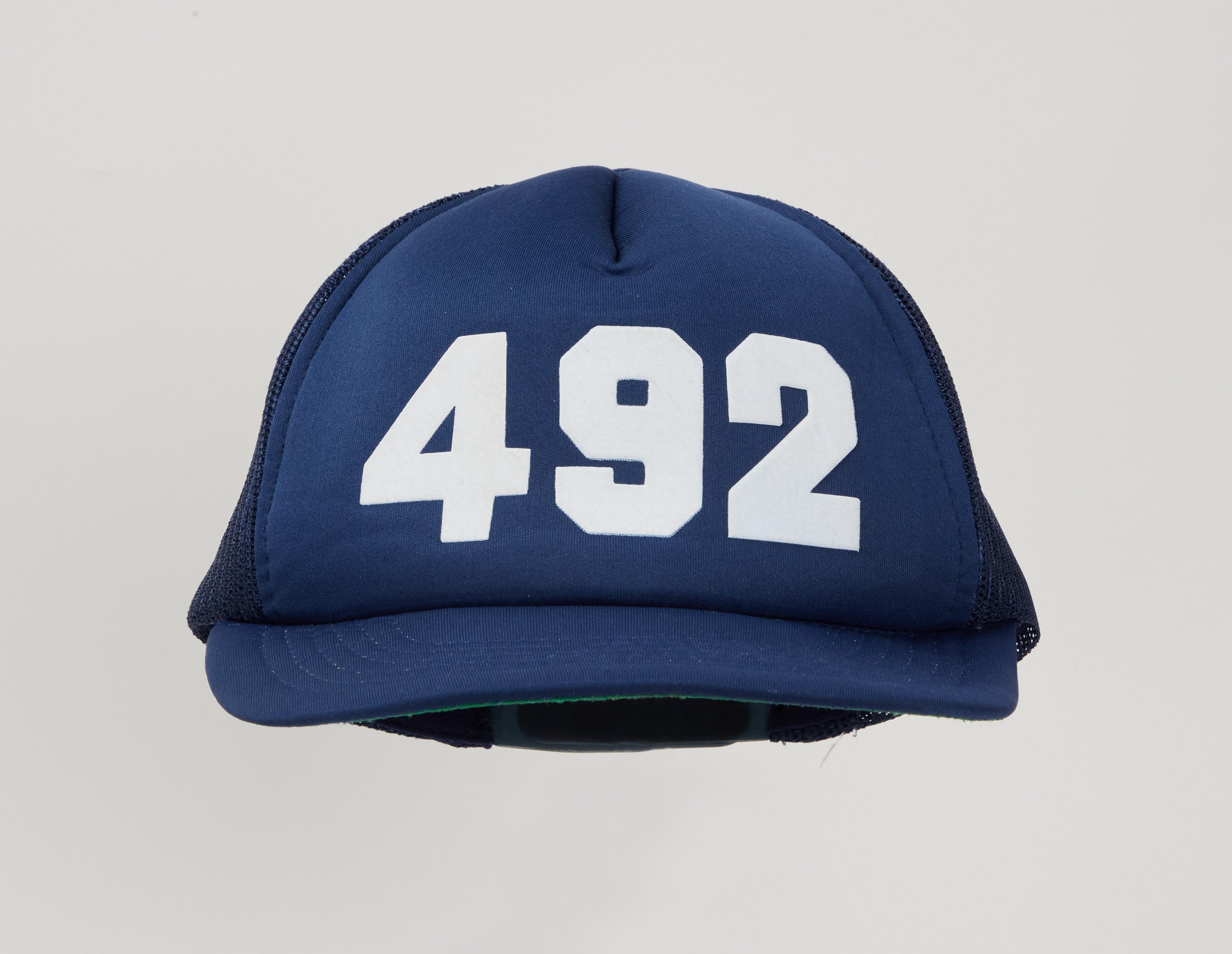 a blue hat with 4 9 2 on it owned by princess diana