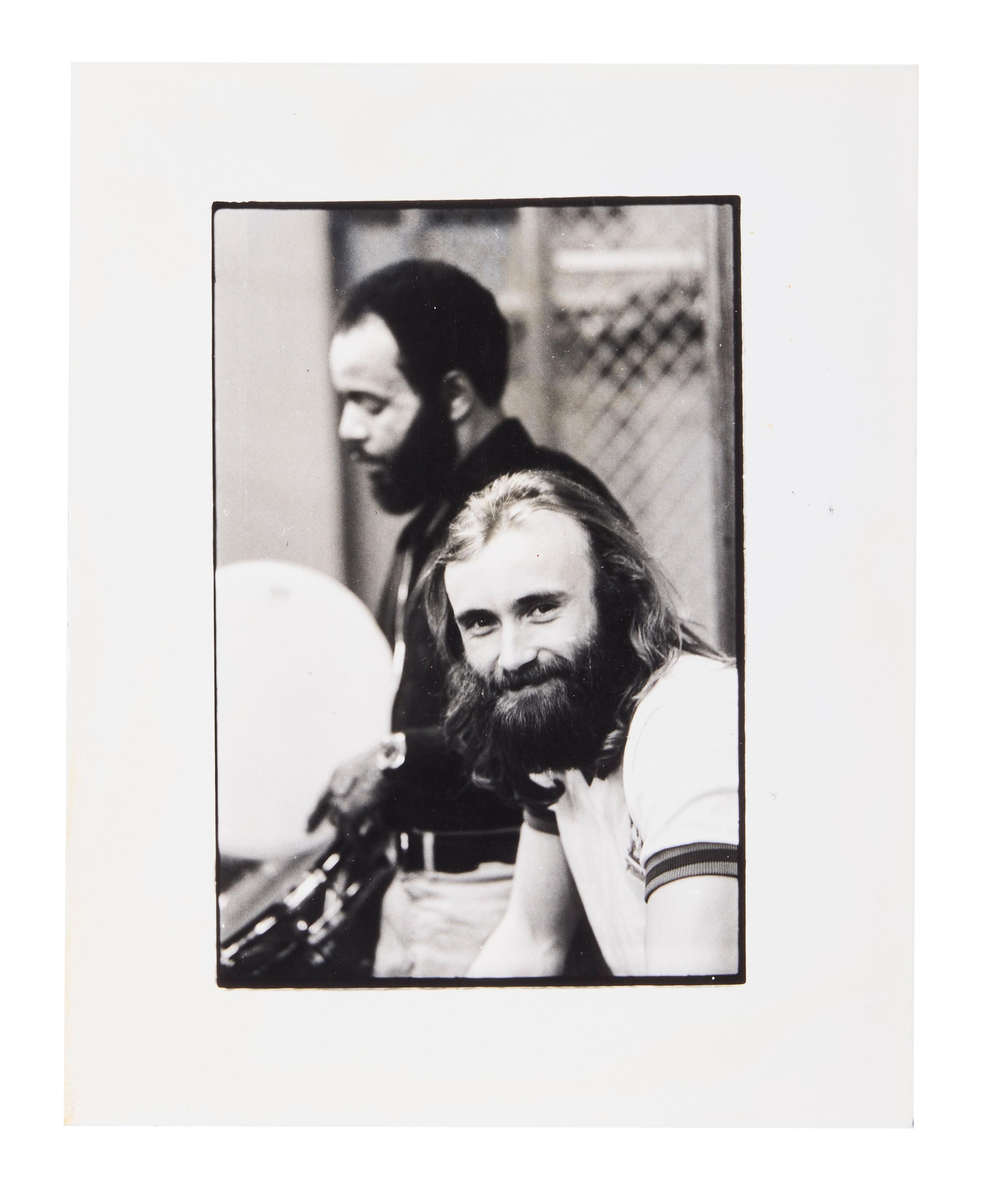 black and white photo of phil collins