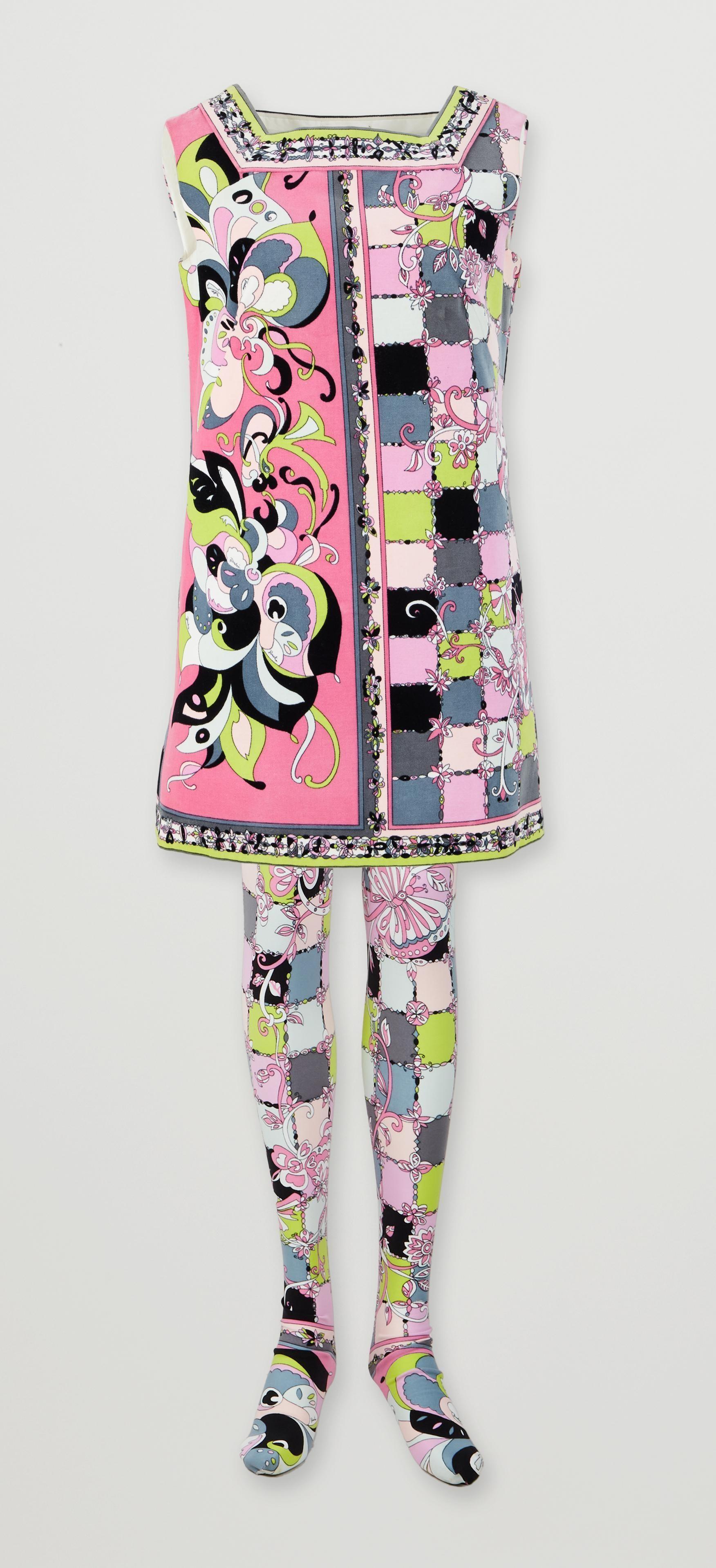 Lot #45. Elizabeth Taylor | Emilio Pucci Pink and Multi-Color Velvet Dress with Matching Tights a pink dress and tights with a floral pattern