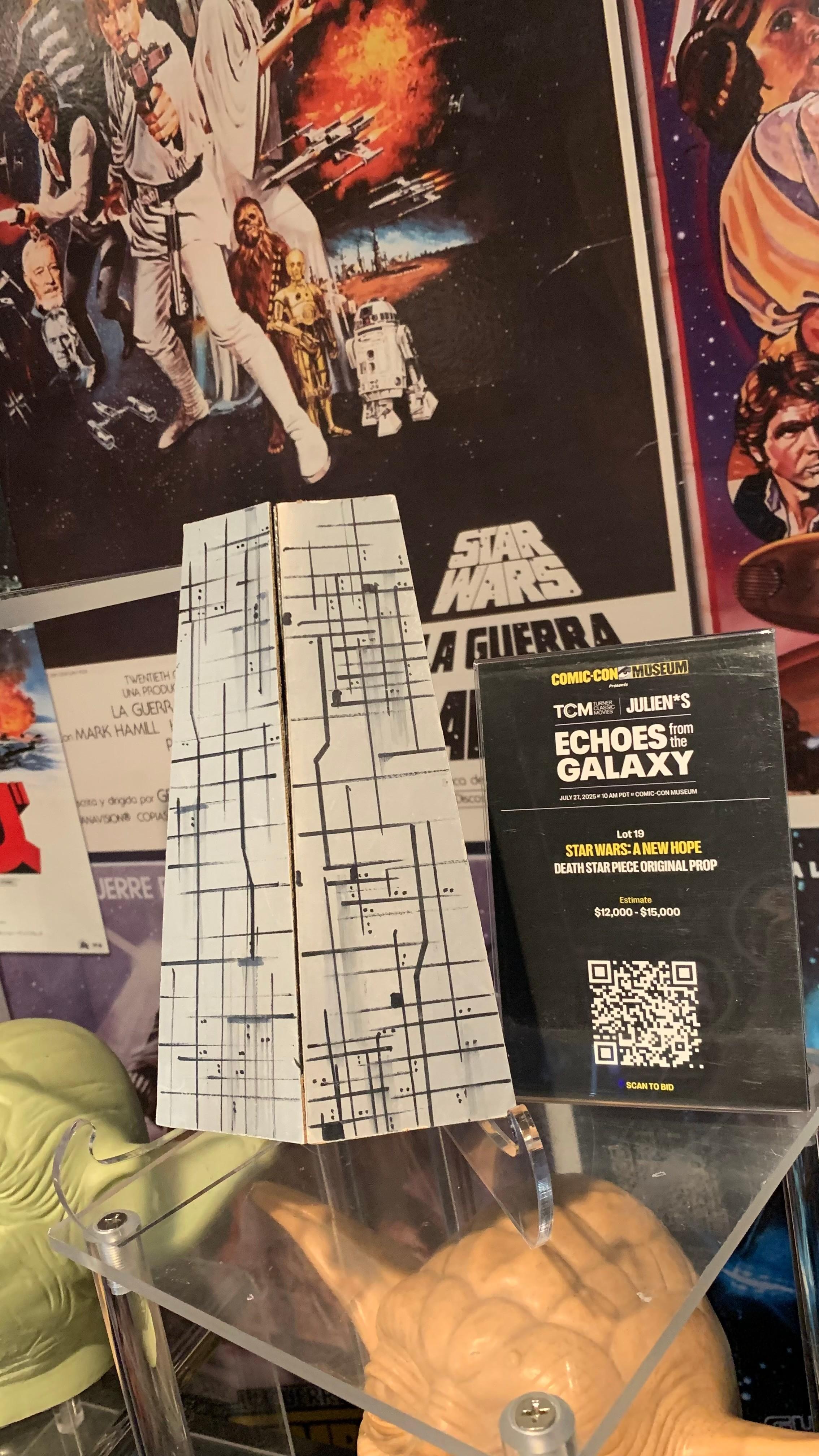 a star wars artifacts on display at the comic con museum