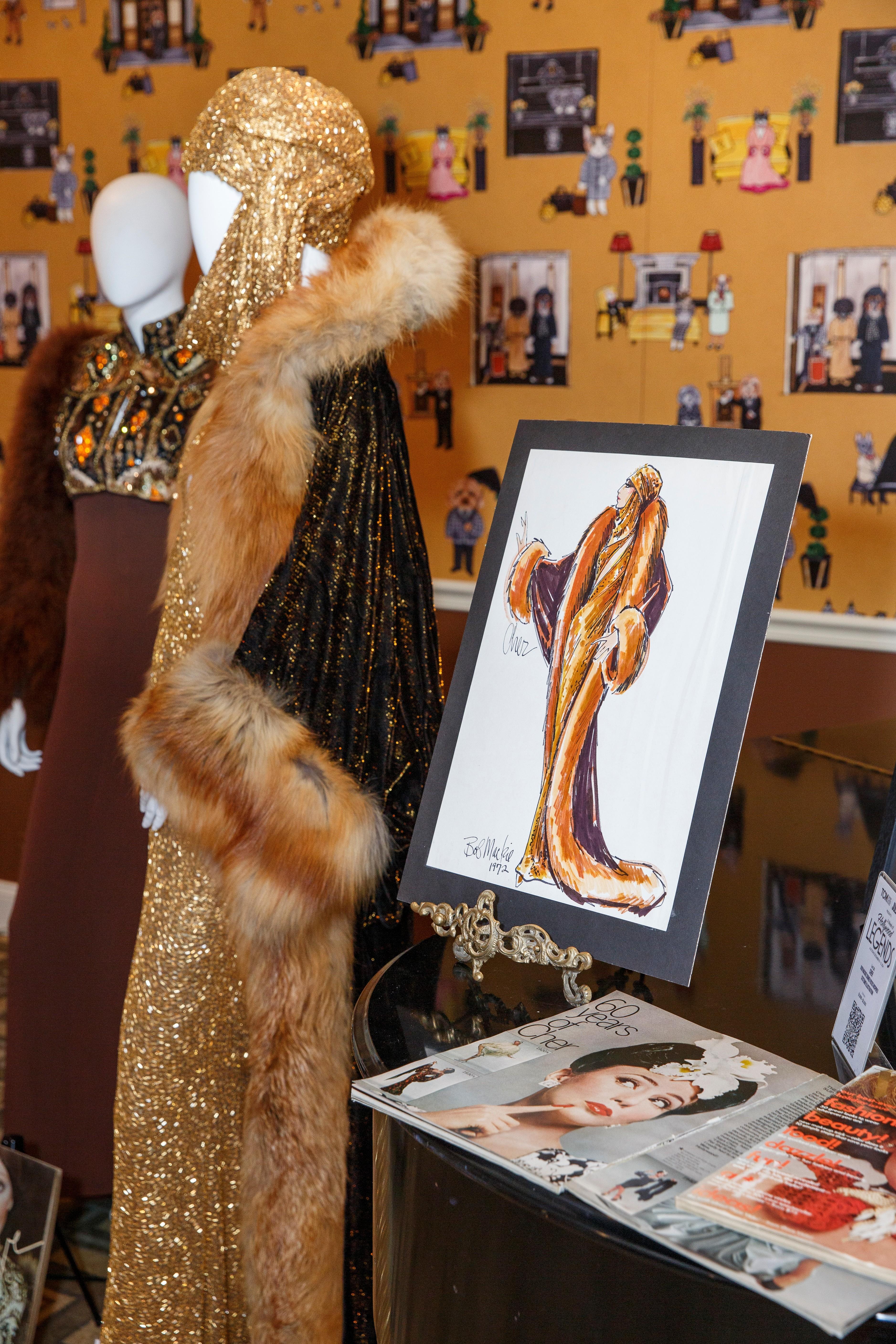 a drawing of a woman in a fur coat is on display