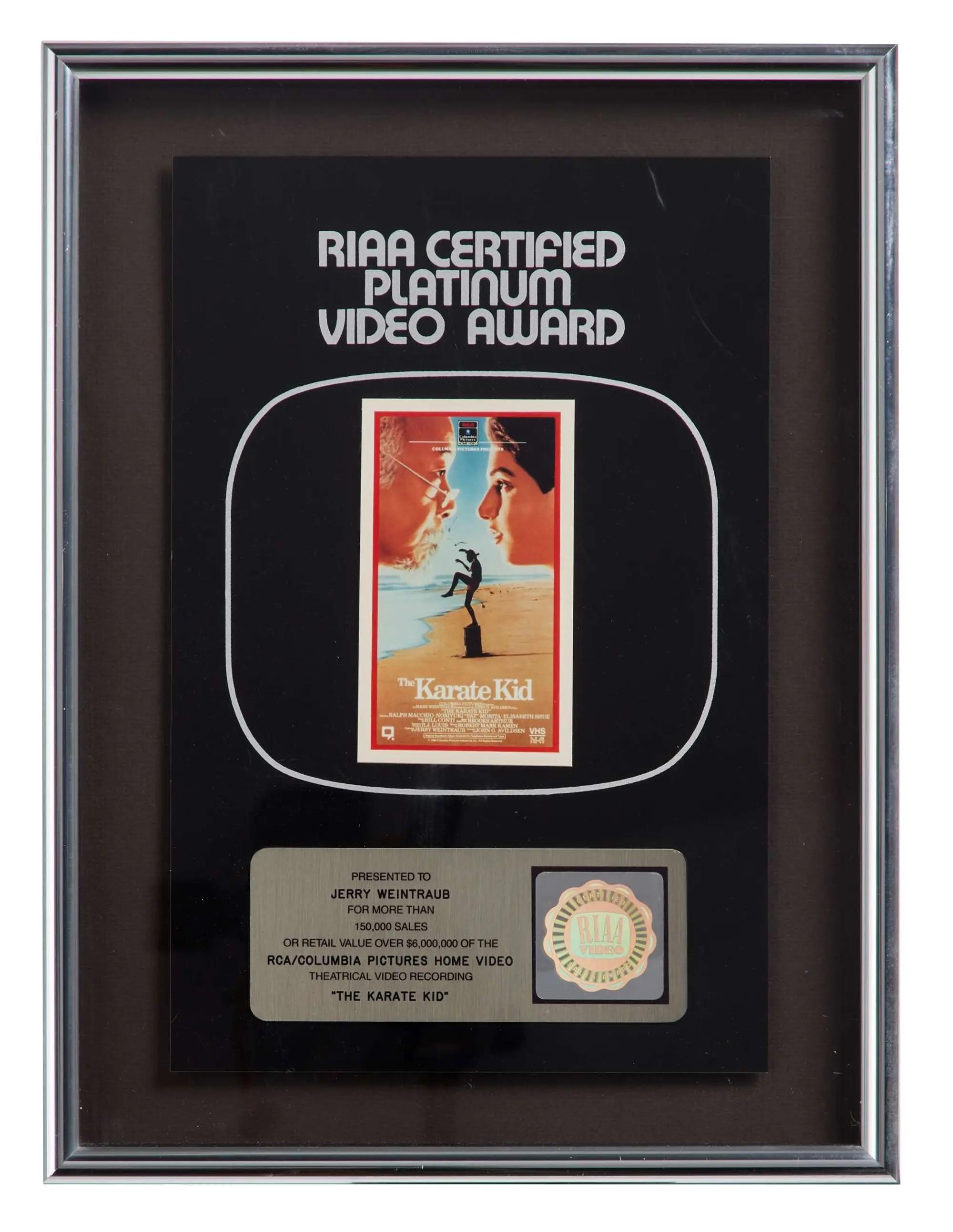 Lot #80  Jerry Weintraub “The Karate Kid” Framed Items