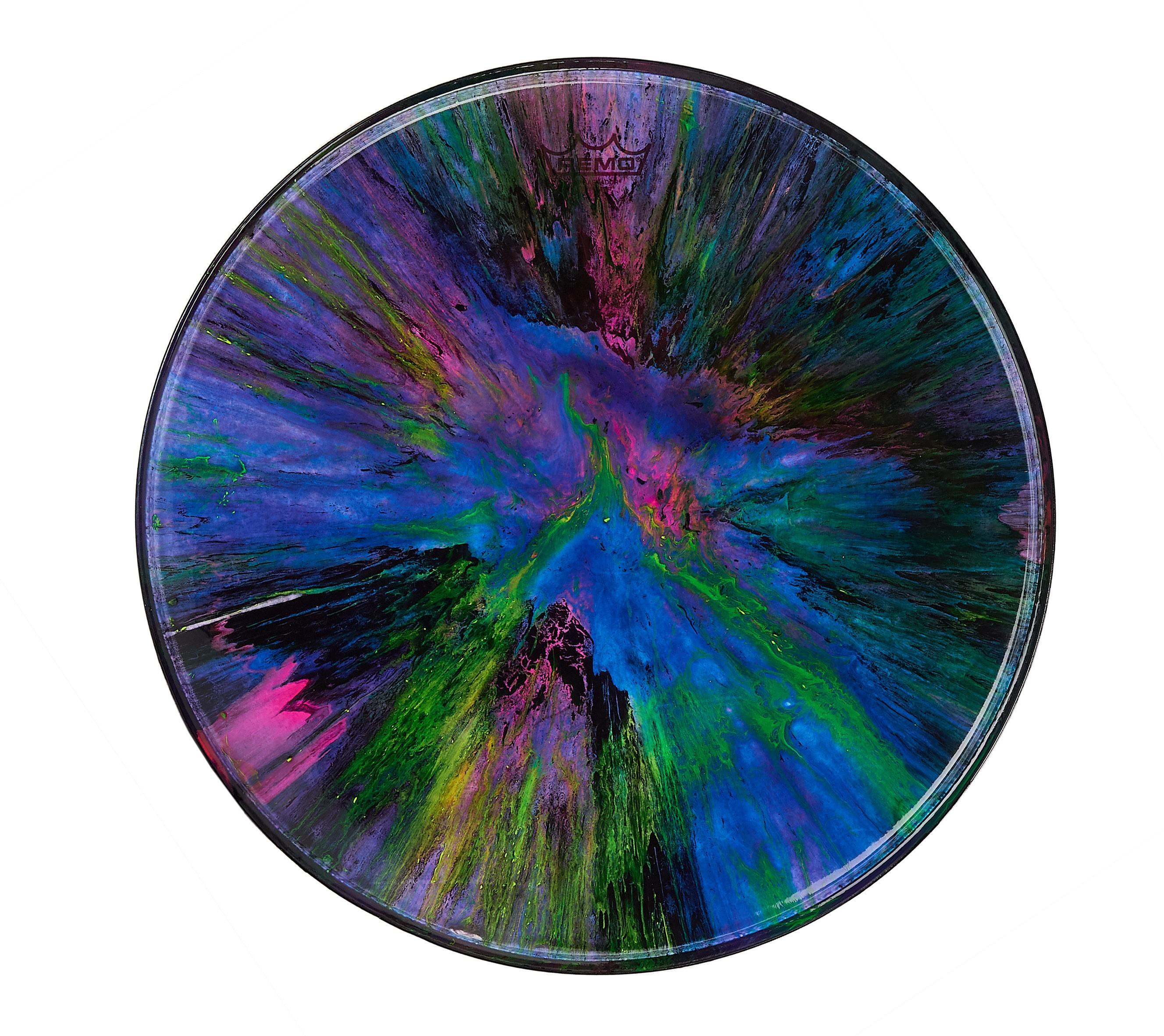 a drum head with a colorful painting on it