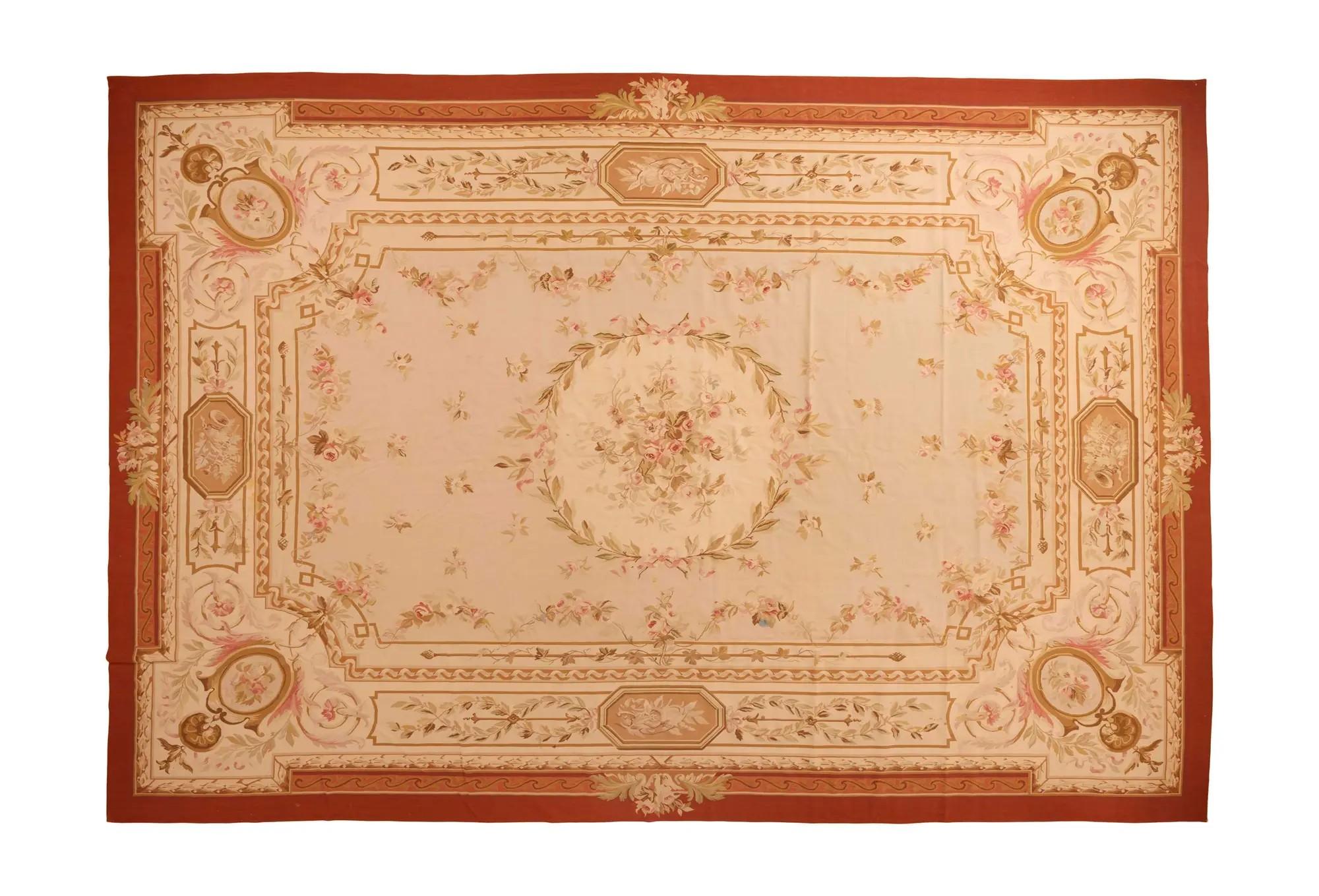 Lot #348. Whoopi Goldberg | Needlepoint Carpet beige and orange needlepoint carpet