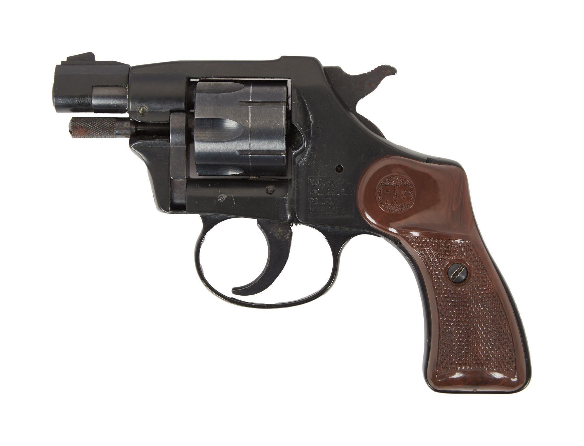 a black revolver with a brown grip on a white background