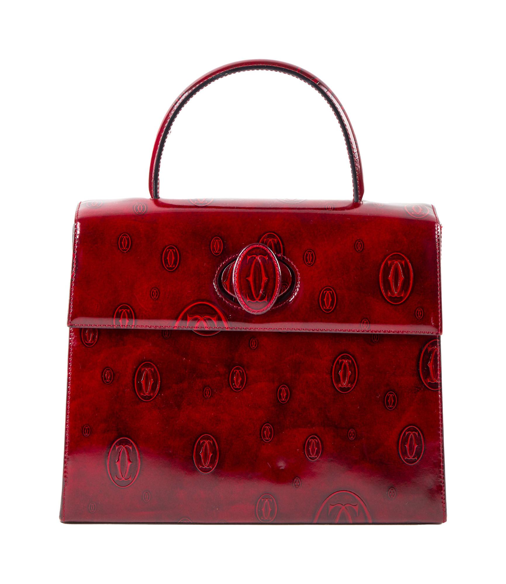 Dame Joan Collins | Cartier Monogram 
